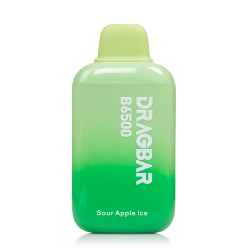 a green bottle sitting on top of a table