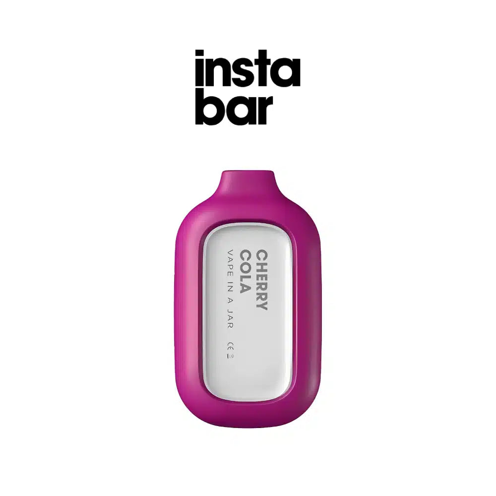 a pink cell phone sitting on top of a table